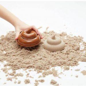 Zandbakvorm 'drol' met zand
