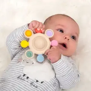baby met Tickit Silisoft pop it bijtspeelgoed